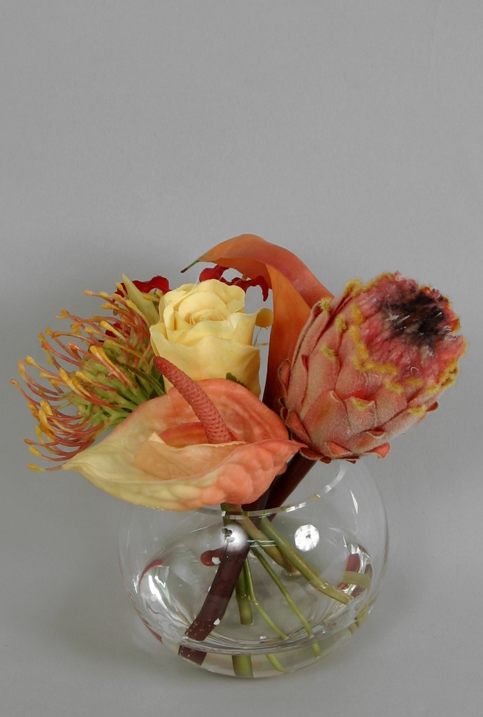 mixed flower arrangement in water 
